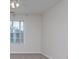 Bedroom features natural light and neutral carpeting, creating a calm atmosphere at 1413 Eastbrooke Way, Marietta, GA 30066