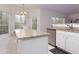 Bright eat-in kitchen with granite countertops, stainless steel appliances, and backyard views at 1413 Eastbrooke Way, Marietta, GA 30066