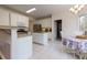 Charming kitchen with white cabinets, granite countertops, and stainless steel appliances at 1413 Eastbrooke Way, Marietta, GA 30066