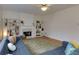 Cozy living room features a fireplace, built-in shelving, hardwood floors, and a comfortable couch at 1413 Eastbrooke Way, Marietta, GA 30066