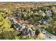 Aerial community view featuring tree-lined streets and well-maintained homes in desirable neighborhood at 5400 Saint Lyonn Pl, Marietta, GA 30068