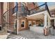 Multi-level backyard with covered outdoor kitchen and spiral staircase at 5400 Saint Lyonn Pl, Marietta, GA 30068