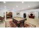 Open game room with a billiards table and access to a library at 5400 Saint Lyonn Pl, Marietta, GA 30068