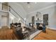 Spacious living room featuring vaulted ceilings, hardwood floors, and a fireplace at 5400 Saint Lyonn Pl, Marietta, GA 30068