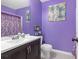 Stylish bathroom featuring a vanity with a white countertop and a patterned shower curtain at 7158 Georges Way, Morrow, GA 30260