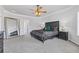 Spacious bedroom with a king bed, neutral walls, soft carpet, and decor at 1784 Treymire Ct, Stone Mountain, GA 30088
