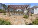 Community patio area featuring stone pillars, wood beam pergola, and comfortable seating at 1784 Treymire Ct, Stone Mountain, GA 30088