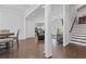 Spacious foyer with hardwood floors and an open staircase at 1784 Treymire Ct, Stone Mountain, GA 30088