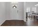 Bright entryway with hardwood floors and view of dining area at 1784 Treymire Ct, Stone Mountain, GA 30088