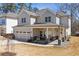 Charming two-story home with inviting front porch and stone accents at 1784 Treymire Ct, Stone Mountain, GA 30088