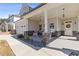 Charming front porch with rocking chairs and stone accents at 1784 Treymire Ct, Stone Mountain, GA 30088