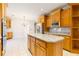 Bright eat-in kitchen featuring granite countertops, stainless appliances, a large island, and ample cabinet space at 2802 Nettle Ln, Buford, GA 30519