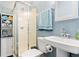 Small bathroom with a shower, cabinet, and light blue walls at 88 Summer Lake Pl, Dallas, GA 30157