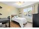 Bright bedroom with wood floors, a window, and neutral paint at 88 Summer Lake Pl, Dallas, GA 30157