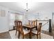 Bright dining room featuring modern decor, hardwood floors, and ample natural light at 88 Summer Lake Pl, Dallas, GA 30157