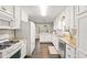 Bright kitchen with white cabinets, granite countertops, and stainless steel appliances at 88 Summer Lake Pl, Dallas, GA 30157