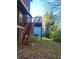 Features a backyard deck with stairs, leading to a private outdoor space at 1085 Mainstreet Valley Dr, Stone Mountain, GA 30088