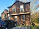 Exterior view of home at 1085 with a black SUV parked nearby at 1085 Mainstreet Valley Dr, Stone Mountain, GA 30088