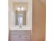 Bathroom featuring a white vanity with a large mirror at 2033 Fosco Dr, Duluth, GA 30097