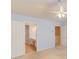 Main bedroom featuring white doors to the bathroom and closet at 2033 Fosco Dr, Duluth, GA 30097