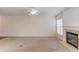 Bright living room with a fireplace and neutral colors at 2033 Fosco Dr, Duluth, GA 30097