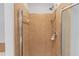 Tiled shower with glass door and adjustable shower head at 2033 Fosco Dr, Duluth, GA 30097