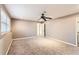 Bedroom with carpet and a ceiling fan at 3045 Riviera Nw Dr, Conyers, GA 30012