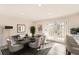 Elegant dining area featuring modern decor and French doors to the patio at 3045 Riviera Nw Dr, Conyers, GA 30012