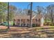 Charming brick home featuring classic shutters and a well-maintained yard at 3045 Riviera Nw Dr, Conyers, GA 30012