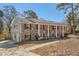 Classic brick home with inviting front facade, shutters, and manicured landscaping at 3045 Riviera Nw Dr, Conyers, GA 30012