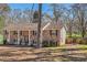 Charming brick home featuring classic shutters and a well-maintained yard at 3045 Riviera Nw Dr, Conyers, GA 30012