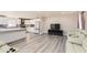 Bright living space with hardwood floors, a modern kitchen, and comfortable seating at 3045 Riviera Nw Dr, Conyers, GA 30012