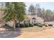 Charming single Gathering home boasting manicured landscaping and a two-car garage at 7238 Hummingbird Ln, Winston, GA 30187
