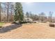 Charming single Gathering home boasting manicured landscaping and a two-car garage at 7238 Hummingbird Ln, Winston, GA 30187