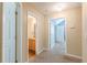 Hallway features access to rooms and bathroom at 7238 Hummingbird Ln, Winston, GA 30187
