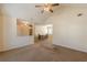 Bright living room and dining area with vaulted ceilings and a neutral color scheme throughout at 7238 Hummingbird Ln, Winston, GA 30187