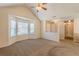 Well-lit living room featuring a bay window and neutral color palette for a relaxing atmosphere at 7238 Hummingbird Ln, Winston, GA 30187