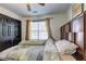 Bright bedroom with modern flooring, a large window, and a closet at 375 Tambec Nw Trce, Lilburn, GA 30047