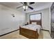 Bright bedroom with natural light, wooden bed frame, creating a serene and inviting space at 375 Tambec Nw Trce, Lilburn, GA 30047