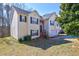 Charming two-story home featuring a well-maintained yard and a two-car garage at 375 Tambec Nw Trce, Lilburn, GA 30047