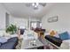 Spacious living room with open floor plan and seamless access to dining area at 375 Tambec Nw Trce, Lilburn, GA 30047