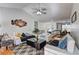 Bright living room with open floor plan and seamless access to dining area at 375 Tambec Nw Trce, Lilburn, GA 30047