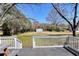 White backyard deck railing overlooking large backyard area at 4212 Logan Dr, Loganville, GA 30052