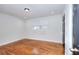 Bright bedroom featuring hardwood floors and natural light at 4212 Logan Dr, Loganville, GA 30052