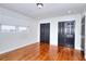 Cozy bedroom featuring hardwood floors, plenty of natural light, and ample closet space at 4212 Logan Dr, Loganville, GA 30052