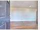 Entryway with beautiful hardwood floors, and neutral paint at 4212 Logan Dr, Loganville, GA 30052