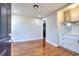Modern kitchenette with white cabinets and stainless steel appliances at 4212 Logan Dr, Loganville, GA 30052