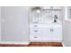 Modern kitchenette with white cabinets and stainless steel appliances at 4212 Logan Dr, Loganville, GA 30052
