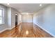 Bright living room with hardwood floors and neutral paint at 4212 Logan Dr, Loganville, GA 30052