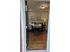 View from entry of the hardwood floors leading to a table and a couch at 4212 Logan Dr, Loganville, GA 30052